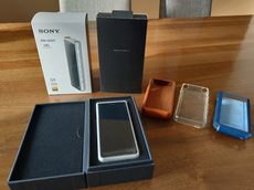 Sony NW-ZX507 silver color in perfect condition, includes 3 cases